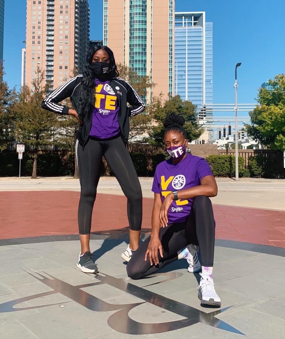 Chiney Ogwumike (left) and her sister, Nneka, after the Los Angeles Sparks players served as poll workers on Election Day.