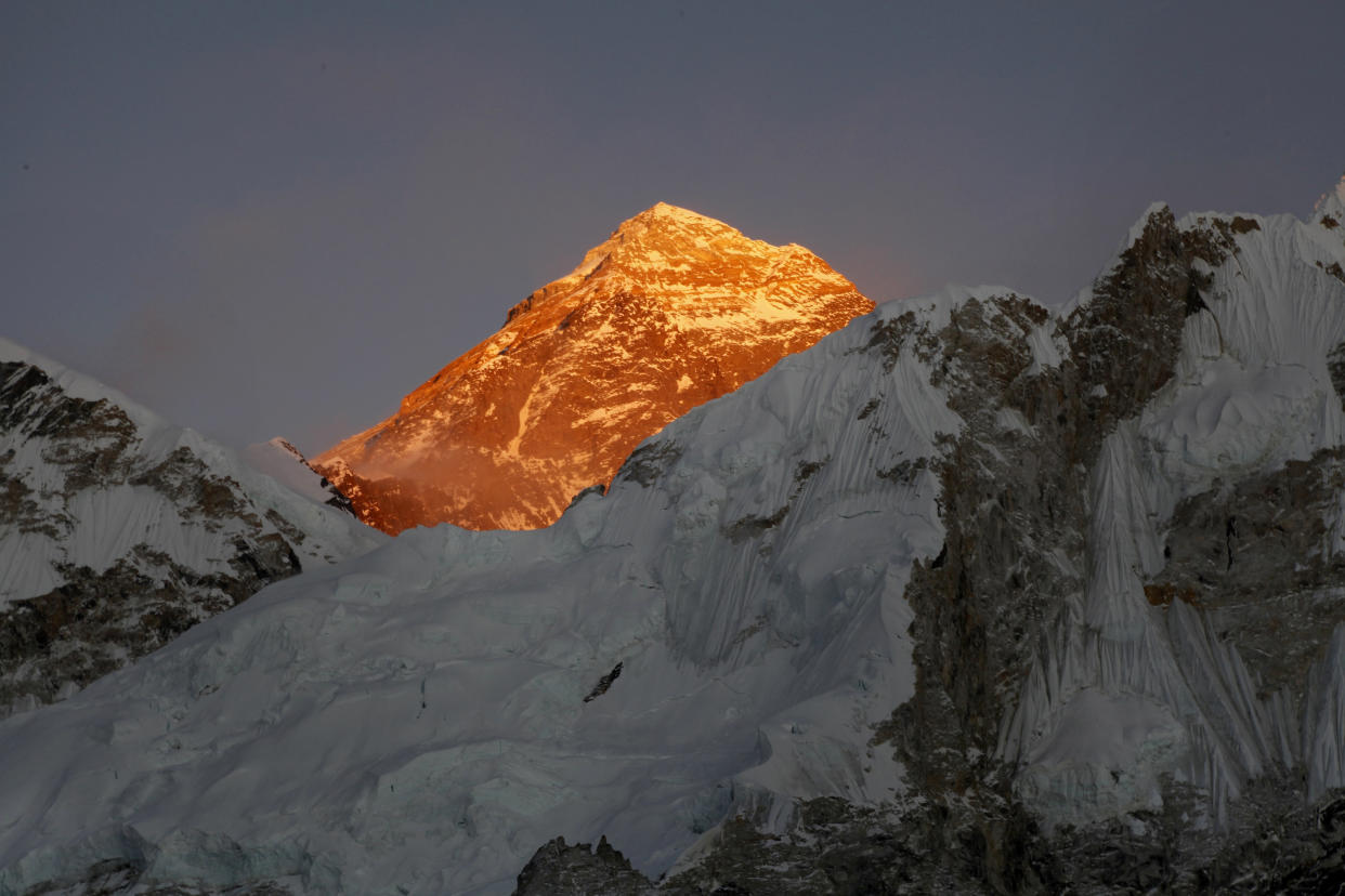 FILE- In this Nov. 12, 2015 file photo, Mt. Everest is seen from the way to Kalapatthar in Nepal. A Swiss climber and an American have died on Mount Everest in the season's first casualties on the world's highest mountain, expedition organizers said Thursday. (AP Photo/Tashi Sherpa, File)