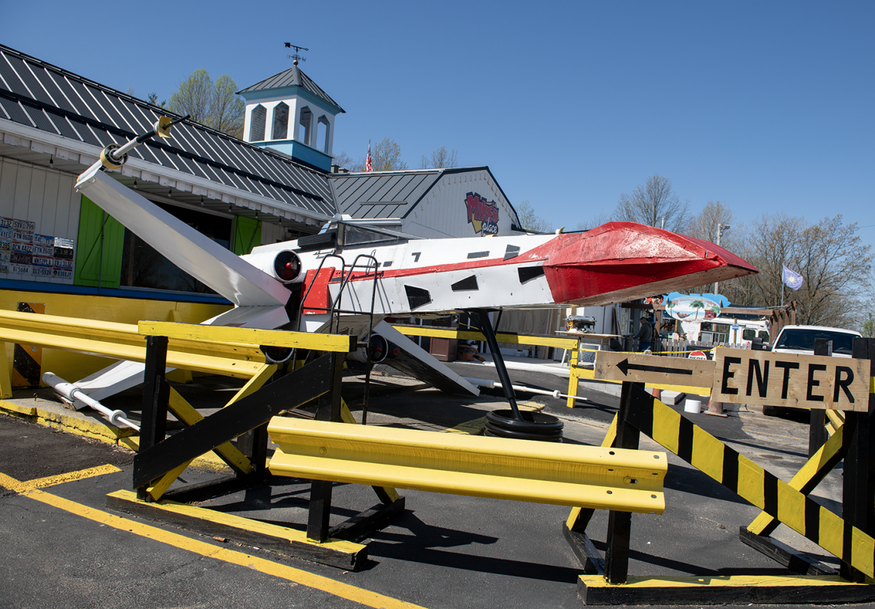 An X-wing starfighter is displayed in front of Mike's Place restaurant in Kent.