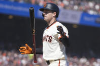 San Francisco Giants' Mike Yastrzemski reacts after striking out against the San Diego Padres during the fourth inning of a baseball game in San Francisco, Friday, April 5, 2024. (AP Photo/Eric Risberg)
