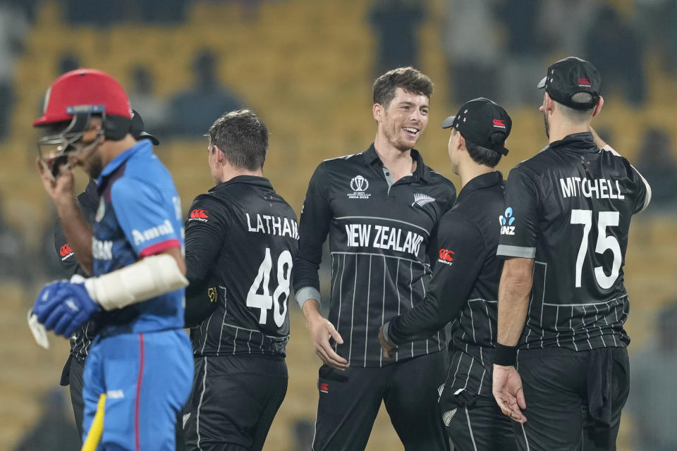 New Zealand's cricketers celebrate their victory in the ICC Cricket World Cup match between Afghanistan and New Zealand in Chennai, India, Wednesday, Oct. 18, 2023. (AP Photo/Eranga Jayawardena)