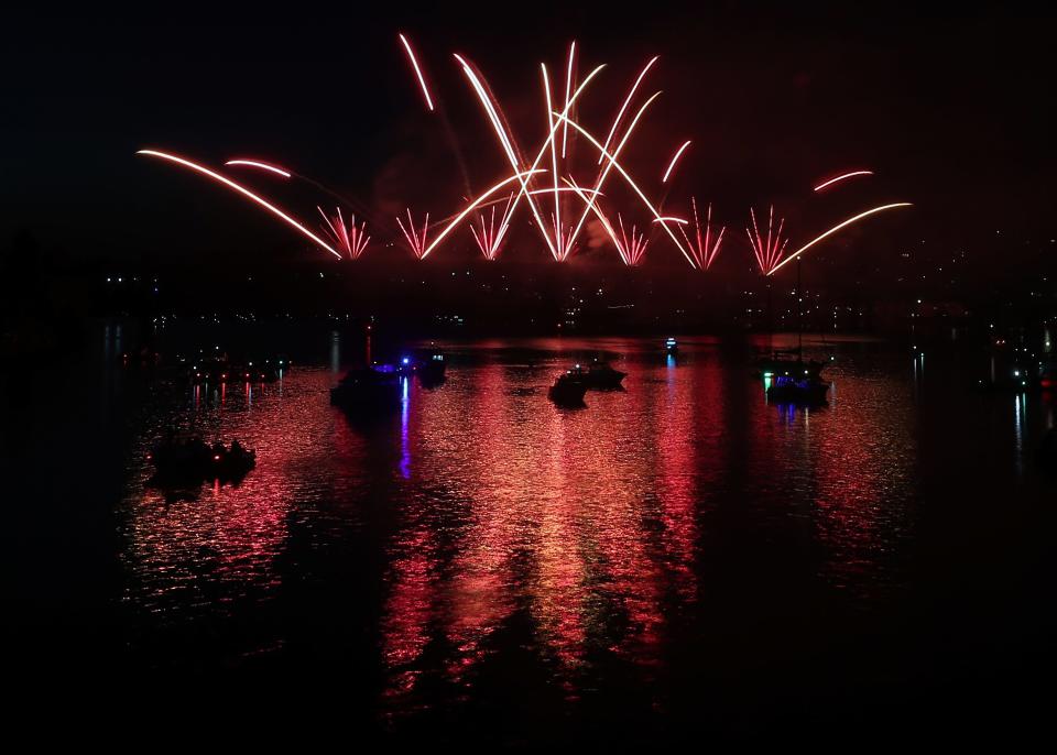 Fireworks off the Manette Bridge light up the sky during the Bremerton Bridge Blast in Bremerton, Wash.