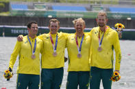 Jack Cleary, Caleb Antill, Cameron Girdlestone and Luke Letcher, of Australia, pose with the bronze medal following the men's rowing quadruple sculls final at the 2020 Summer Olympics, Wednesday, July 28, 2021, in Tokyo, Japan. (AP Photo/Darron Cummings)