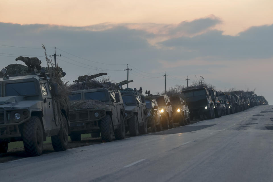 ROSTOV, RUSSIA - FEBRUARY 23: A convoy of Russian military vehicles is seen as the vehicles move towards border in Donbas region of eastern Ukraine on February 23, 2022 in Russian border city Rostov. (Photo by Stringer/Anadolu Agency via Getty Images)