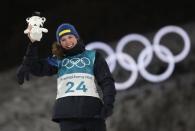 Biathlon - Pyeongchang 2018 Winter Olympics - Women's 15km Individual Final - Alpensia Biathlon Centre - Pyeongchang, South Korea - February 15, 2018 - Gold medalist Hanna Oeberg of Sweden celebrates during the victory ceremony. REUTERS/Murad Sezer