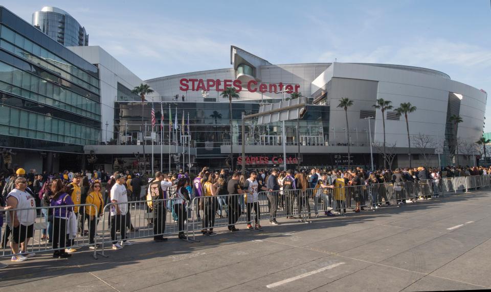 Fans arrive to attend the "Celebration of Life for Kobe and Gianna Bryant" service at Staples Center in Downtown Los Angeles on February 24, 2020.(Photo by Mark RALSTON / AFP) (Photo by MARK RALSTON/AFP via Getty Images)