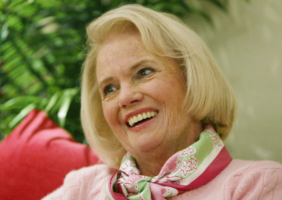 FILE -In this Thursday, April 15, 2004, file photo, Designer Lilly Pulitzer, smiles during an interview in her clothing company's Manhattan fashion district offices. Pulitzer, known for her tropical print dresses, died in Florida at 81 on Sunday, April, 7, 2013. (AP Photo/Kathy Willens)