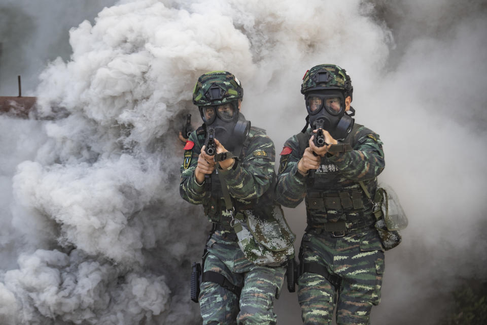 Armed police carry out a comprehensive anti-terrorism drill in South China's Guangxi Zhuang Autonomous Region. Source: Getty