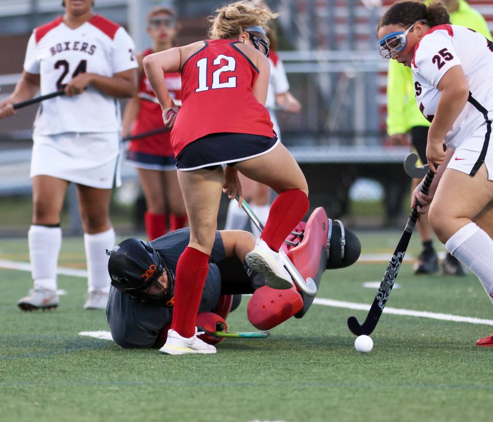 Brockton's Molly Corvino makes the save on Bridgewater-Raynham's Samantha Bean during a game on Wednesday, Sept. 21, 2022.  