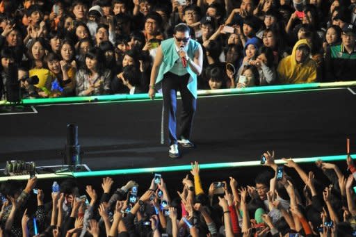 South Korean singer Park Jae-Sang, also known as Psy, performs during his free concert in Seoul on October 4, 2012. Psy brought his hit "Gangnam Style" home Thursday with a raucous free concert in Seoul, capping a month of global chart success that turned the chubby 34-year-old into a national hero