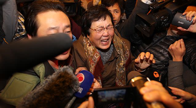 A relative of a passenger onboard Malaysia Airlines flight MH370 cries at Lidu Hotel in Beijing. Photo: Getty Images