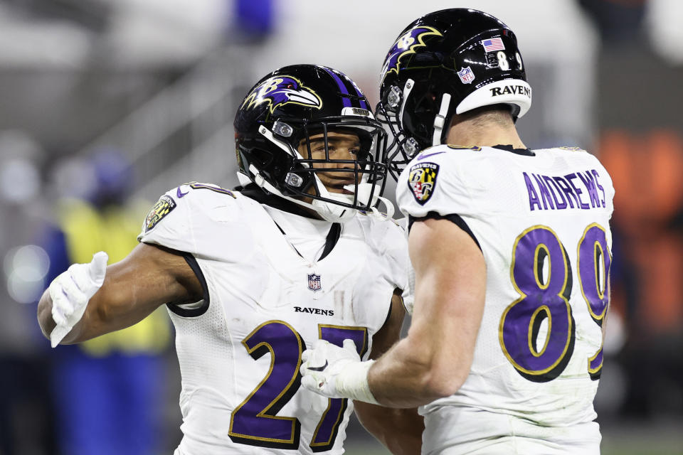 Baltimore Ravens running back J.K. Dobbins (27) celebrates with tight end Mark Andrews (89) after Dobbins scored a one-yard touchdown during the second half of an NFL football game against the Cleveland Browns, Monday, Dec. 14, 2020, in Cleveland. (AP Photo/Ron Schwane)
