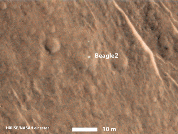 Officials think that the Beagle 2 lander (seen as a bright spot here) partially deployed its solar panels when it reached the surface of Mars in 2003. European Space Agency officials lost contact with the lander after it was released down to th