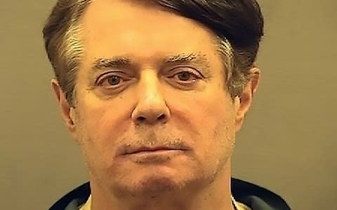  Paul Manafort's mugshot. The former Trump campaign chairman is set to stand trial at the end of July - Credit: Alexandria Sheriff's Office