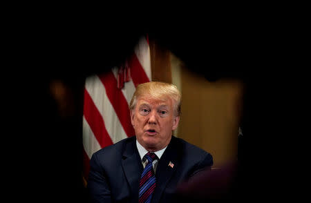 U.S. President Donald Trump speaks during a meeting with governors and members of Congress at the White House in Washington, U.S., April 12, 2018. REUTERS/Kevin Lamarque
