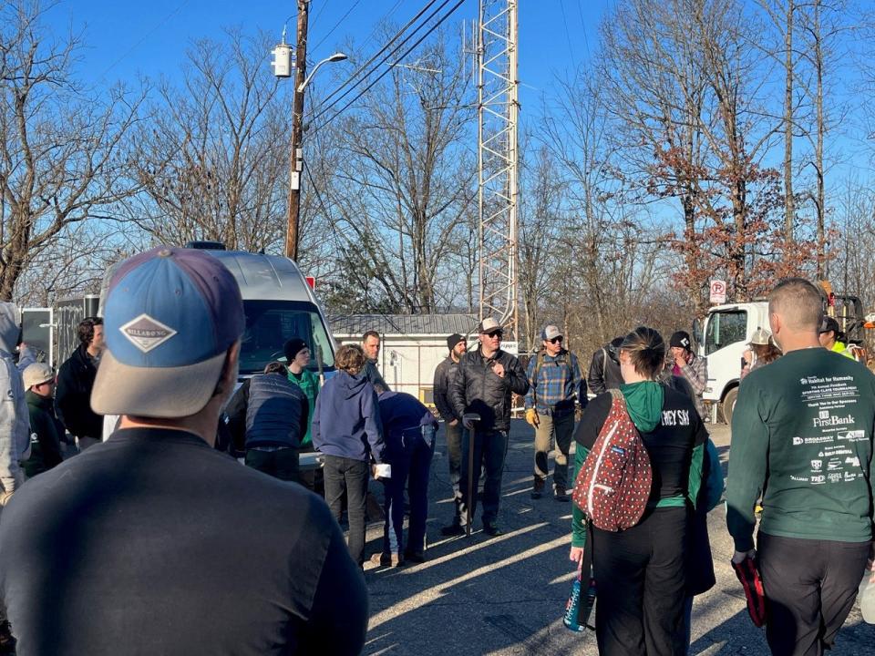 Mike Kellogg, at center, speaks to the volunteers at Appalachian Mountain Bike Club's February Work Day on Sharp's Ridge in Knoxville, Tenn., Feb. 3, 2024.