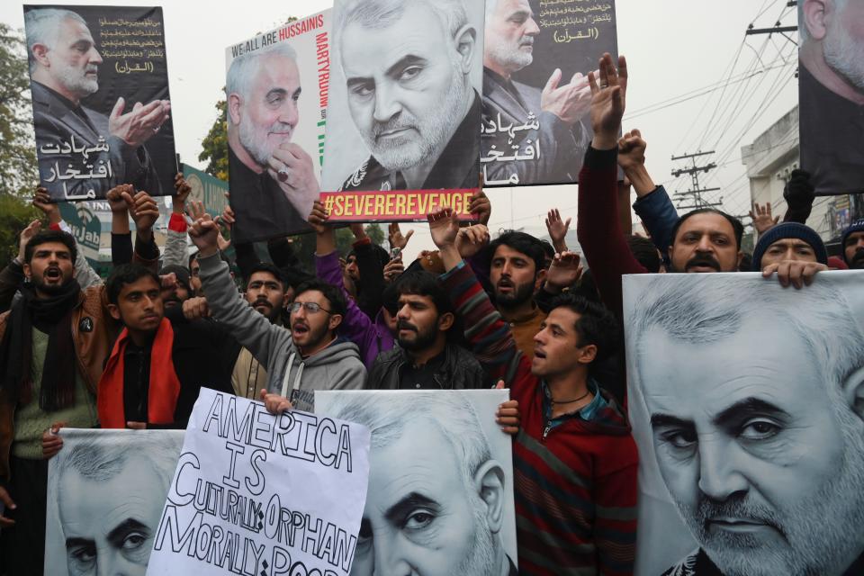 Pakistani Shiite Muslim protest against the killing of top Iranian commander Qasem Soleimani in Iraq, outside the US consulate in Lahore on January 7, 2020. - A stampede broke out January 7 at the funeral of a top Iranian general killed in a US drone strike, leaving 40 people dead and many injured as huge crowds packed his hometown. (Photo by ARIF ALI / AFP) (Photo by ARIF ALI/AFP via Getty Images)