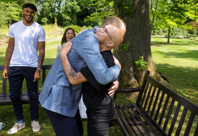<p>Kensington Palace / Andy Parsons</p> Prince William hugs one of those involved in Homewards at Windsor