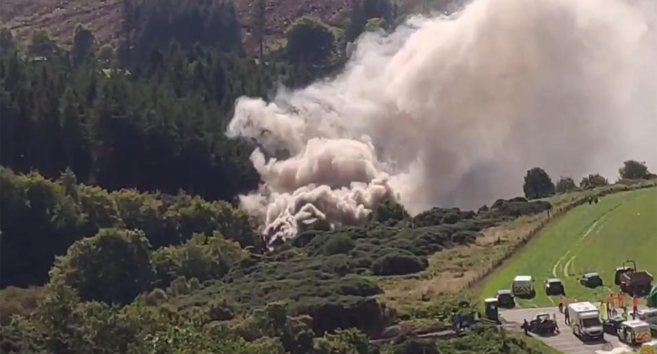 Smoke billows from the train after it derailed, killing at least one person. Source: Twitter