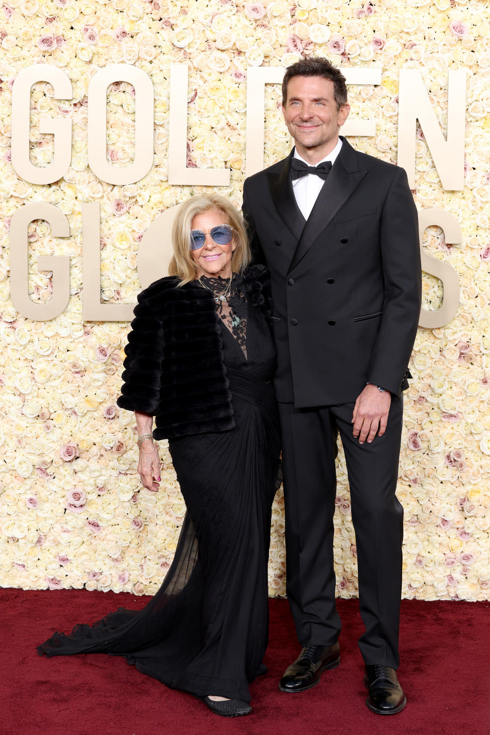 BEVERLY HILLS, CALIFORNIA - JANUARY 07: (L-R) Gloria Campano and Bradley Cooper attend the 81st Annual Golden Globe Awards at The Beverly Hilton on January 07, 2024 in Beverly Hills, California. (Photo by Monica Schipper/GA/The Hollywood Reporter via Getty Images)