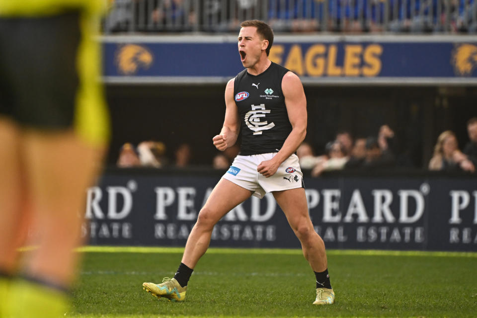 PERTH, AUSTRALIA - AUG 18: Matthew Owies of the Blues celebrates a goal during the 2024 AFL Round 23 match between the West Coast Eagles and the Carlton Blues at Optus Stadium on August 18, 2024 in Perth, Australia. (Photo by Daniel Carson/AFL Photos via Getty Images)