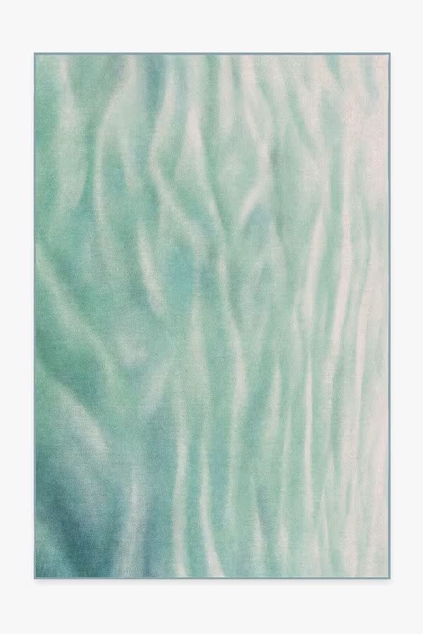 <p><a href="https://go.redirectingat.com?id=74968X1596630&url=https%3A%2F%2Fruggable.com%2Fproducts%2Fgray-malin-nantucket-waves-aqua-medium-pile-rug%3Fsize%3D6x9%26system%3Drug-sys&sref=https%3A%2F%2F" rel="nofollow noopener" target="_blank" data-ylk="slk:Shop Now;elm:context_link;itc:0;sec:content-canvas" class="link ">Shop Now</a></p><p>Nantucket Waves Aqua Tufted Rug</p><p>ruggable.com</p><p>$458.15</p>