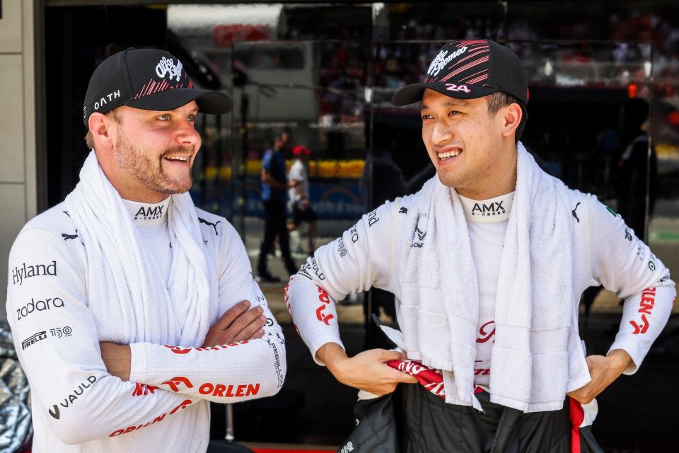 Valterri Bottas of Alfa Romeo and Finland and Guanyu Zhou