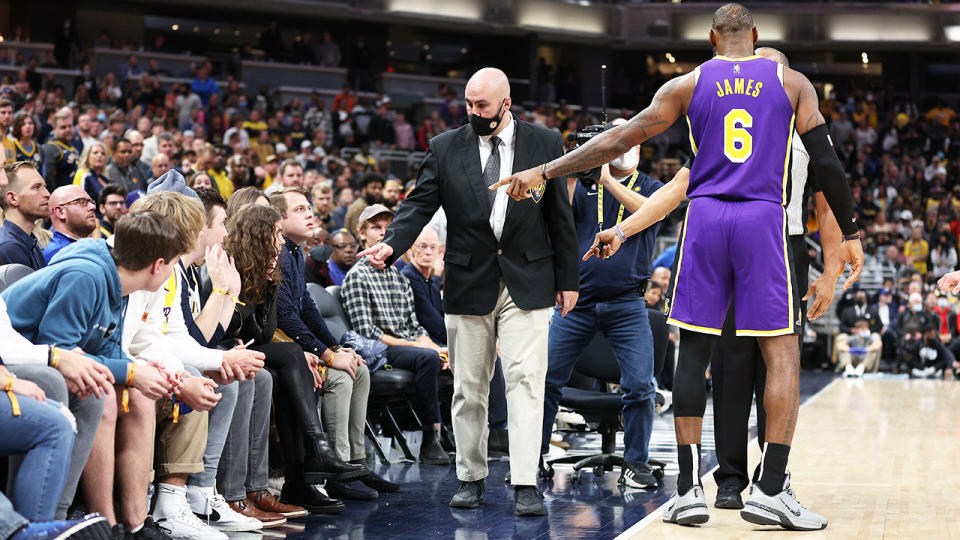 LeBron James, pictured here pointing out the two fans that he asked to be ejected.