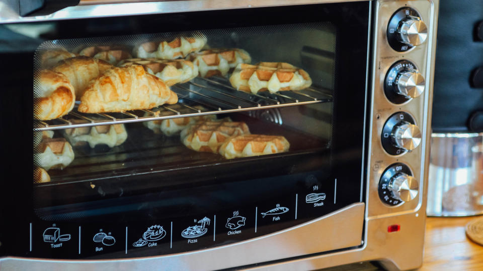 A toaster oven's control panel, filled with pastry