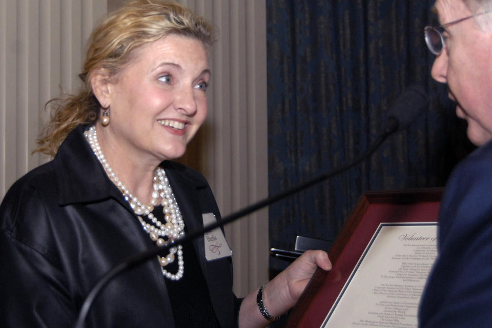 FILE-In this Friday, April 25, 2008, file photo, Jane Hardin, left, accepts a volunteer of the year award from John White, chancellor of the University of Arkansas at Fayetteville, right, on behalf of her mother, Johnelle Hunt, during the University of Arkansas at Fayettville Board of Advisors Dinner, in Little Rock, Ark. Johnelle Hunt, 80, has a net worth $1.6 billion and ranks 298th in Forbes' 2012 400 list. With late husband Johnnie, Johnelle Hunt founded J.B. Hunt Transport Services in 1969 and grew the company into one of the largest truckers in the nation. (AP Photo/Mike Wintroath, File)