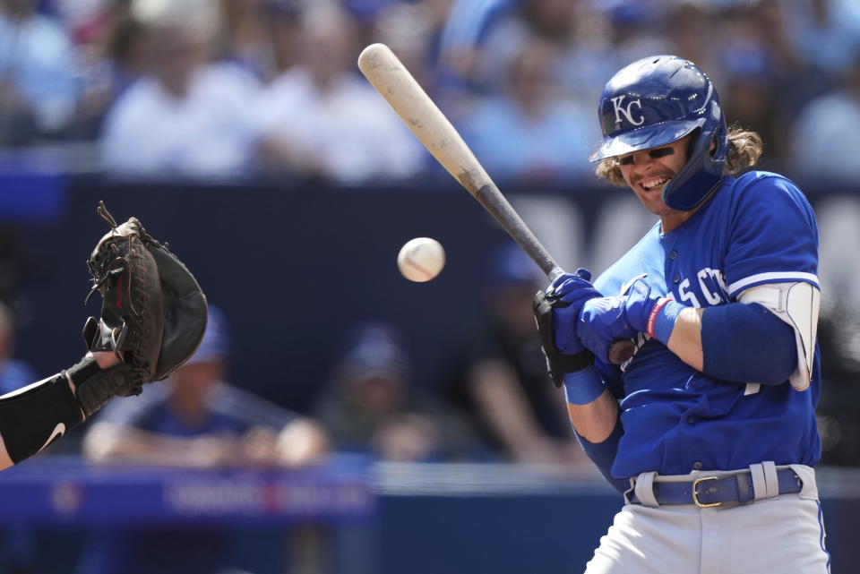 Kansas City Royals shortstop Bobby Witt Jr. (7) reacts to an inside pitch against the Toronto Blue Jays during the sixth inning of a baseball game in Toronto on Sunday, Sept. 10, 2023. (Nathan Denette/The Canadian Press via AP)