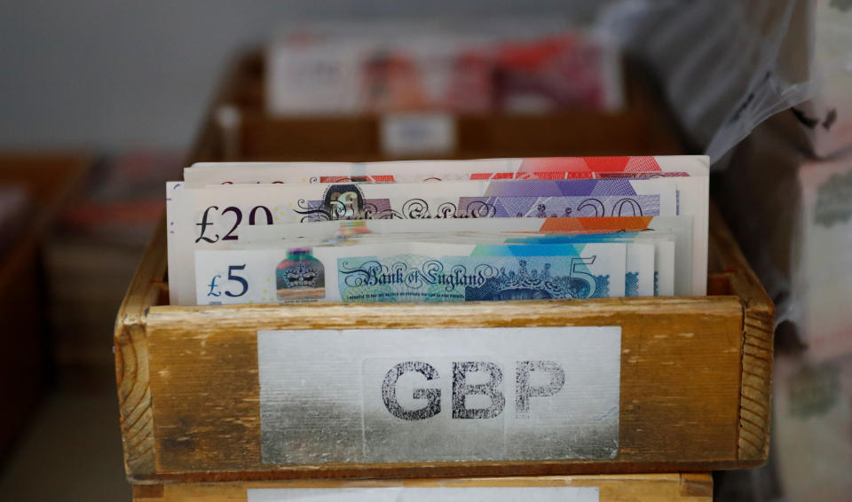 Investment  British Pound Sterling banknotes are seen in a box at the Money Service Austria company's headquarters in Vienna, Austria, November 16, 2017.REUTERS/Leonhard Foeger