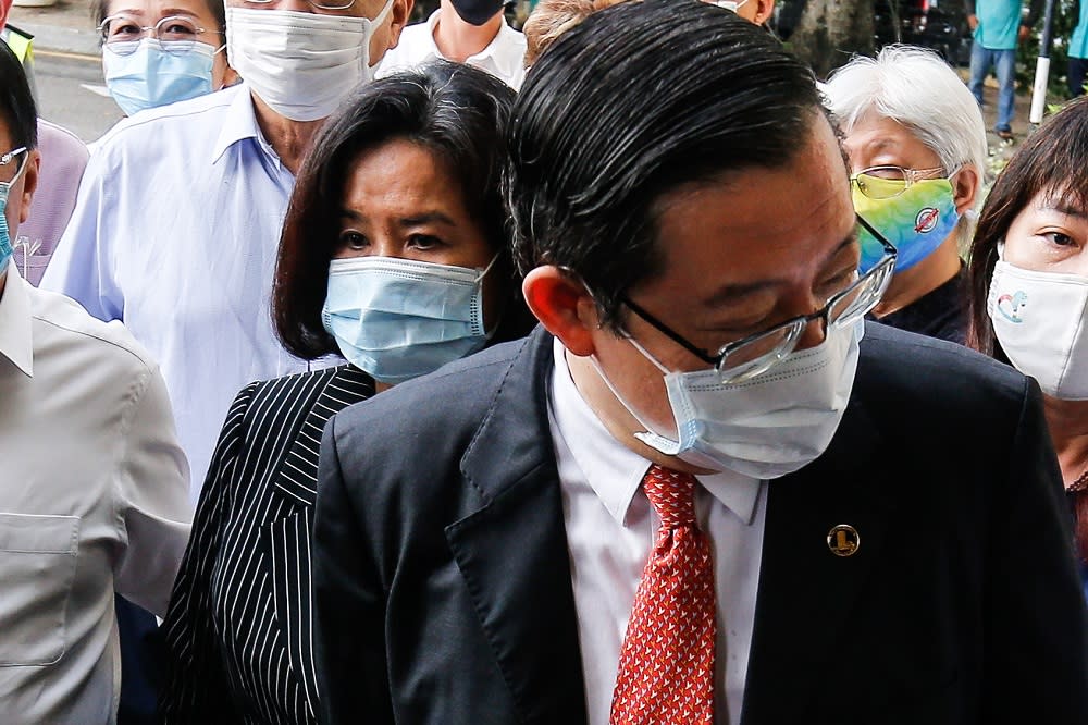 Former Penang chief minister Lim Guan Eng and his wife Betty Chew arrive at the Butterworth courthouse August 11, 2020. — Picture by Sayuti Zainudin