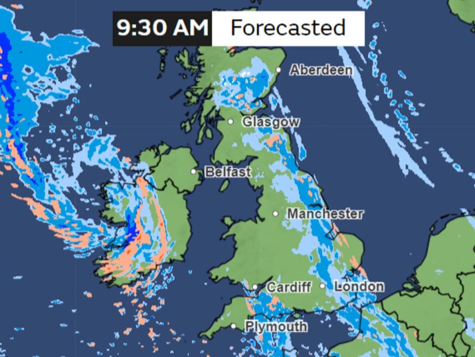 Met Office forecast shows rainfall and snow forecast for Tuesday morning, with a band of rain seen covering eastern parts of the country in blue while some snow and frost can be seen in the north (Met Office)