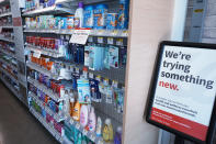 A sign is describing the store's new design is displayed at a Walgreens pharmacy store in Deerfield, Ill., Thursday, July 25, 2024. (AP Photo/Nam Y. Huh)