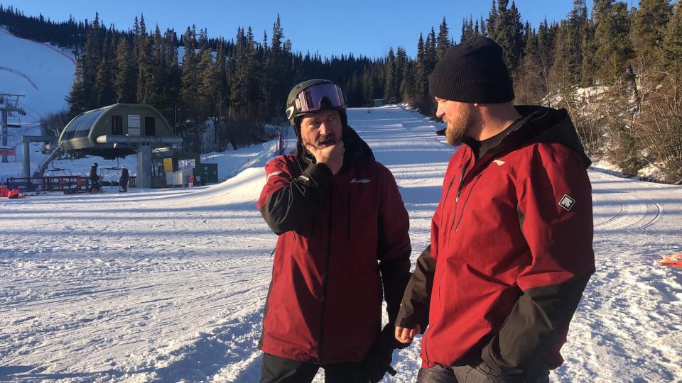 Tyler Turner, right, a Paralympic gold medallist was training in Whitehorse with his coach Mark Fawcett.