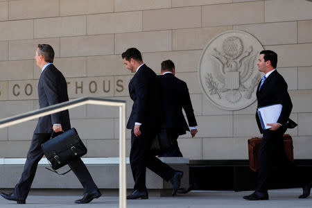 Lawyers representing Michael Cohen and U.S. President Donald Trump arrive at U.S. District Court to deal with a case involving Stephanie Clifford, also known as Stormy Daniels, in Los Angeles, California, U.S., April 20, 2018. REUTERS/Mike Blake