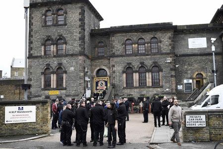 Prison guards stand outside Wandsworth Reform Prison as they take unofficial strike action to protest against staffing levels and health and safety issues, in London, Britain, November 15, 2016. REUTERS/Dylan Martinez