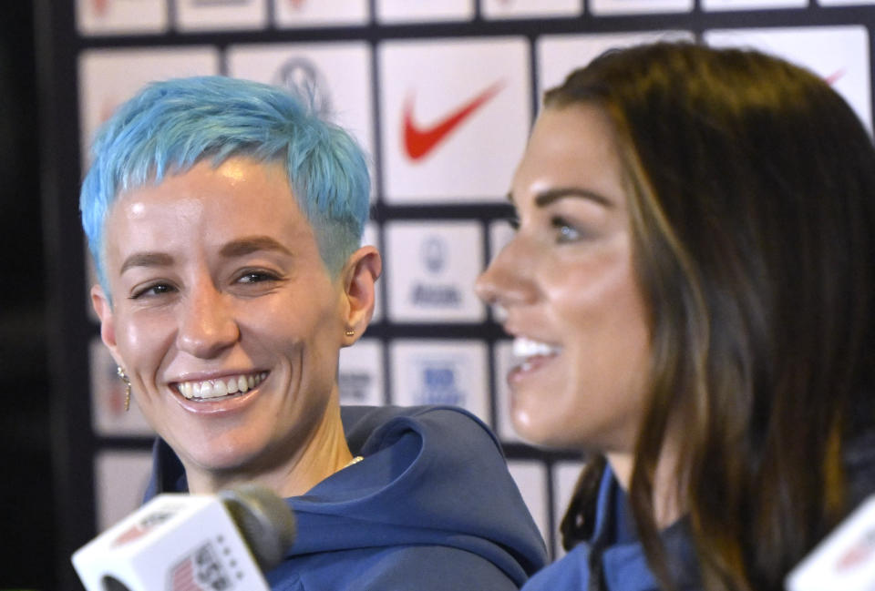 Carson, CA - June 27:  Megan Rapinoe, left, smiles as Alex Morgan answers a question during the US women's national soccer team media day for the upcoming women's world cup in Australia and New Zealand at Dignity Health Sports Park in Carson on Tuesday, June 27, 2023. (Photo by Keith Birmingham/MediaNews Group/Pasadena Star-News via Getty Images)