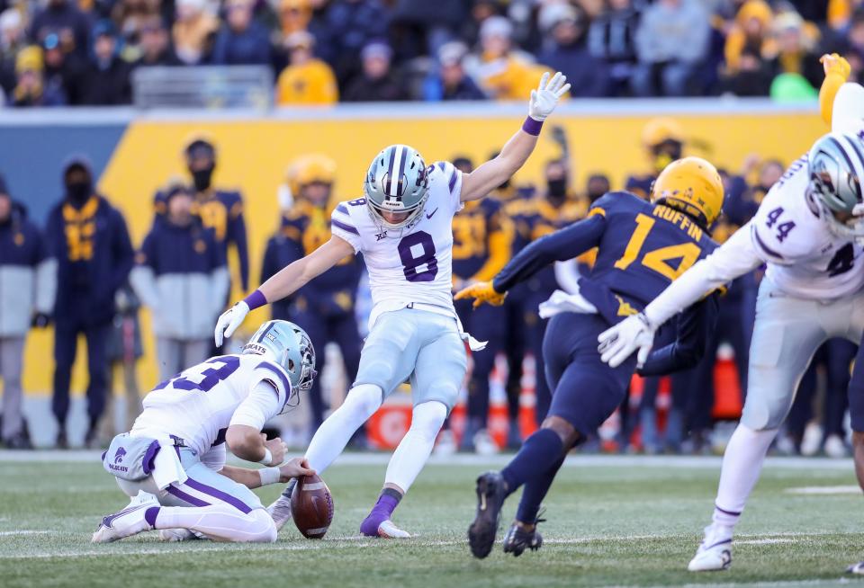 Kansas State's Ty Zentner (8) kicks a 46-yard field goal against West Virginia on Saturday in Morgantown, W.Va.