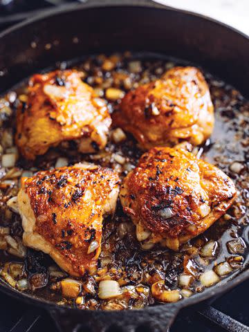 <p>Eric Wolfinger</p> Stephen Colbert and Evie McGee Colbert's spicy honey-lemon chicken thighs