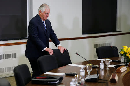 U.S. Secretary of State Rex Tillerson takes a seat as he and Defense Secretary James Mattis prepare to hold U.S.-Japan Security talks with Japan's Foreign Minister Taro Kono and Defense Minister Itsunori Onodera at the State Department in Washington, U.S. August 17, 2017. REUTERS/Jonathan Ernst