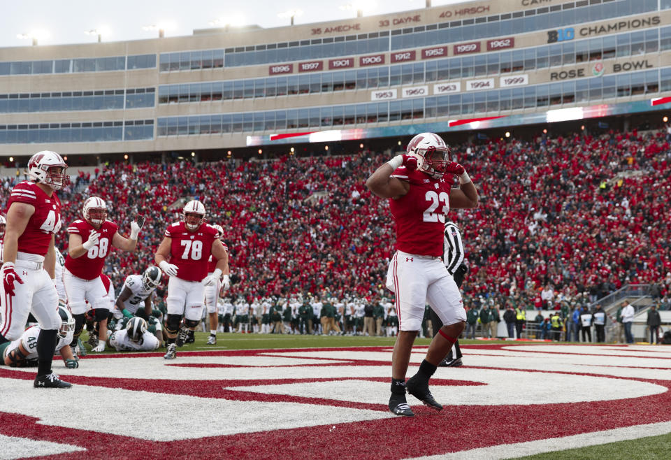 Oct 12, 2019; Madison, WI, USA; Wisconsin Badgers running back Jonathan Taylor (23) celebrates after scoring a touchdown during the fourth quarter against the Michigan State Spartans at Camp Randall Stadium. Mandatory Credit: Jeff Hanisch-USA TODAY Sports