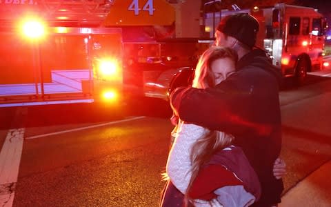 The gunman burst into the bar around 11:20 p.m, dressed in all black  - Credit: Al Seib / Los Angeles Times via Getty Images