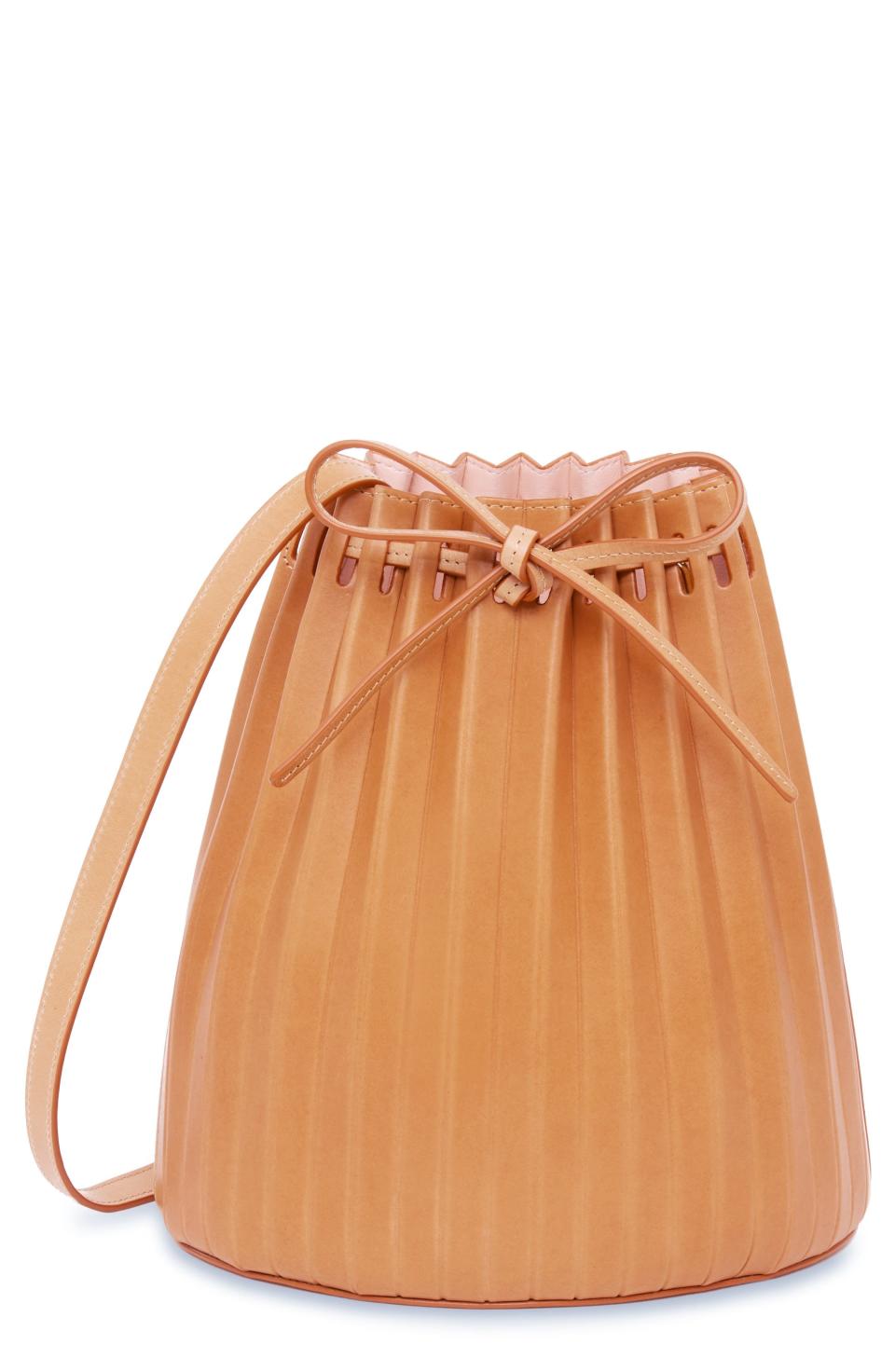 <p><strong>Mansur Gavriel</strong></p><p>nordstrom.com</p><p><a href="https://go.redirectingat.com?id=74968X1596630&url=https%3A%2F%2Fwww.nordstrom.com%2Fs%2Fmansur-gavriel-pleated-leather-bucket-bag%2F6653683&sref=https%3A%2F%2Fwww.harpersbazaar.com%2Ffashion%2Ftrends%2Fg38151228%2Fnordstrom-black-friday-cyber-monday-deals-2021%2F" rel="nofollow noopener" target="_blank" data-ylk="slk:Shop Now;elm:context_link;itc:0;sec:content-canvas" class="link ">Shop Now</a></p><p><strong><del>$795</del> $556</strong></p><p>Accordion pleats are a unique structural touch, while the bucket interior can store all your essentials. </p>