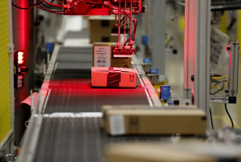 FILE PHOTO: Packaged products are scanned at an Amazon Fulfilment Center in Tracy