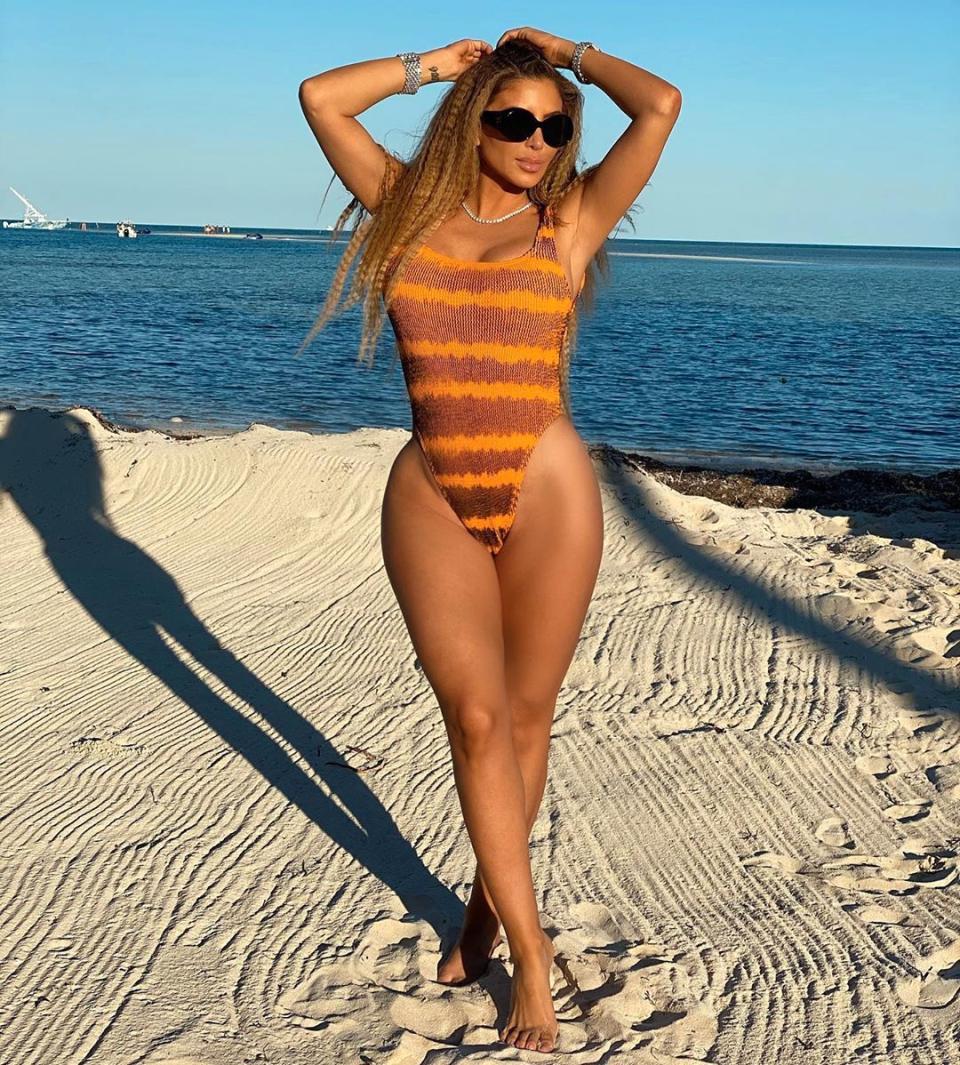 Larsa Pippen poses in a swimsuit