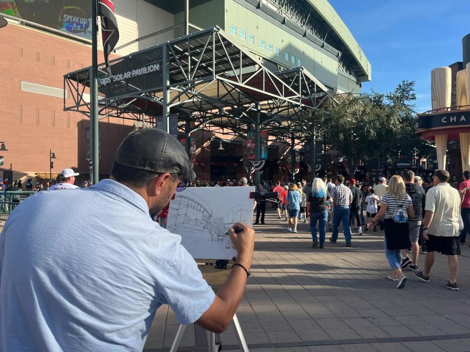 Live event artist Michael Feathers attended Game 5 of the World Series between the Arizona Diamondbacks and Texas Rangers on Wednesday, Nov. 1, 2023 at Chase Field in Phoenix.