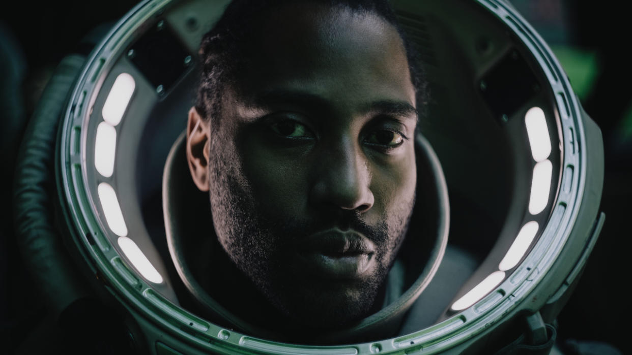  John David Washington shown in close up wearing a spacesuit in The Creator. 