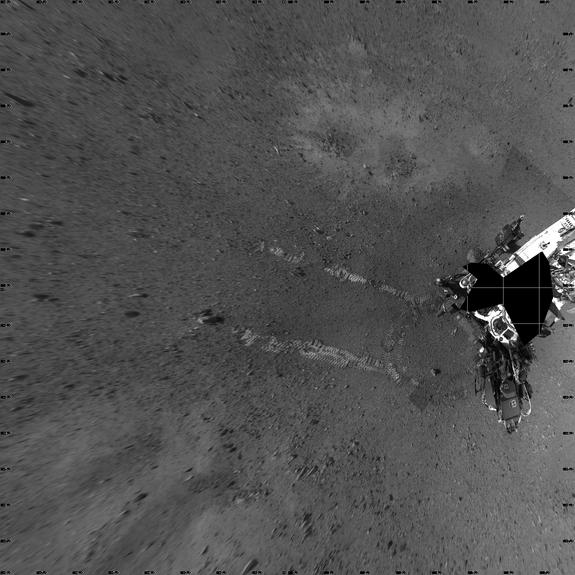 NASA's Mars rover Curiosity took this image its landing site "Bradbury Landing" on Aug. 22, 2012, after a successful test drive. The landing site is named in honor of the late science fiction author Ray Bradbury, and taken on what would have be